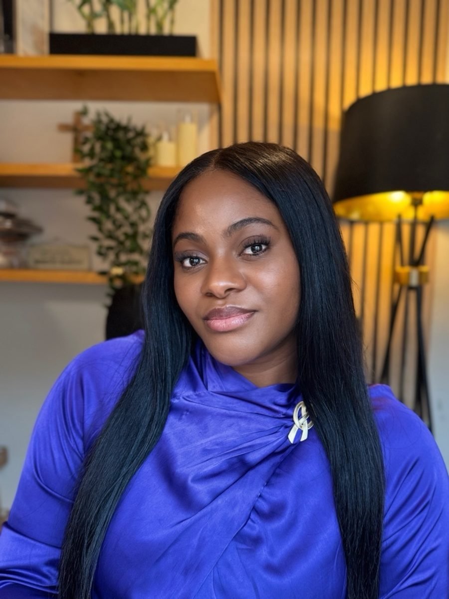 Beke Cynthia Ogbaide in a blue satin top
